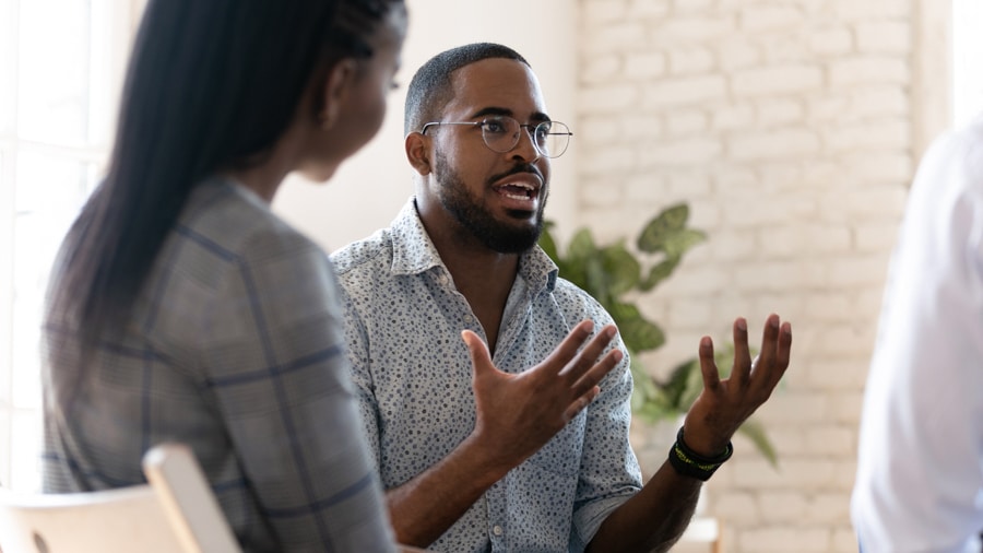 man in family therapy session