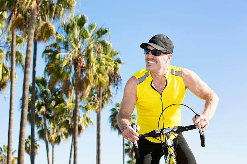 happy man biking outside