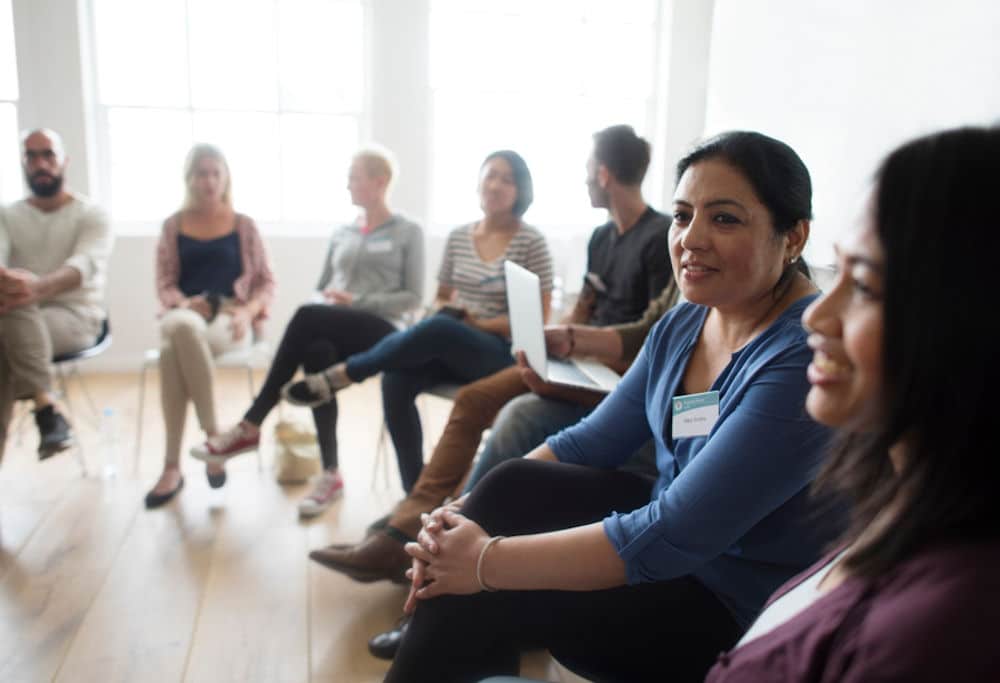 group in therapy in sober living home